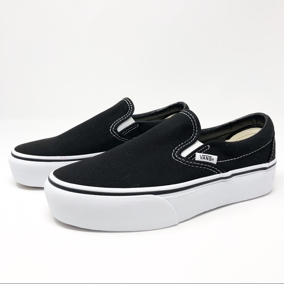 black white slip ons